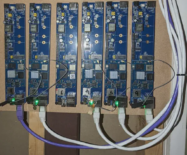 Cluster boards mounted on the wall for testing