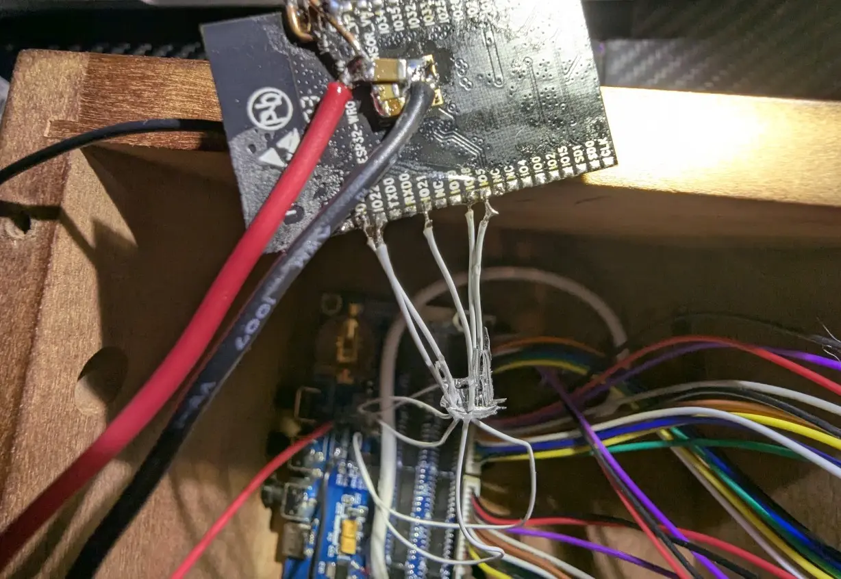 The ESP32 module dead-bugged onto the modwires